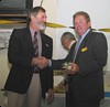  Ian Cook presents George Holman with the Seaducer Lures Trophy 