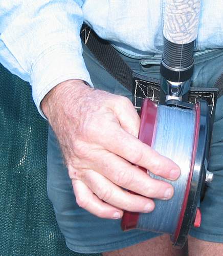 Move your finger tips and feel for any problems with the line on the spool