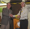  Doug Edward presents Peter Stoeckel with a special Dry Casting Award. 